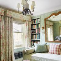 Pale Blue Bedroom with Floral Curtains