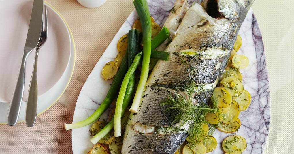 Baked sea bass with baby leeks, potatoes, raki and dill Fish Recipes