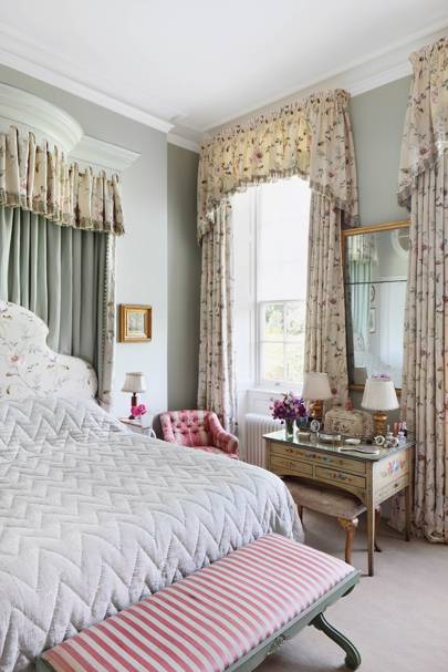 Blue Bedroom with Floral Curtains