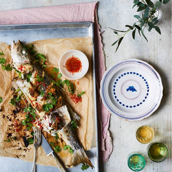 Baked sea bass fillets with lemon and avocado oil and crispy capers